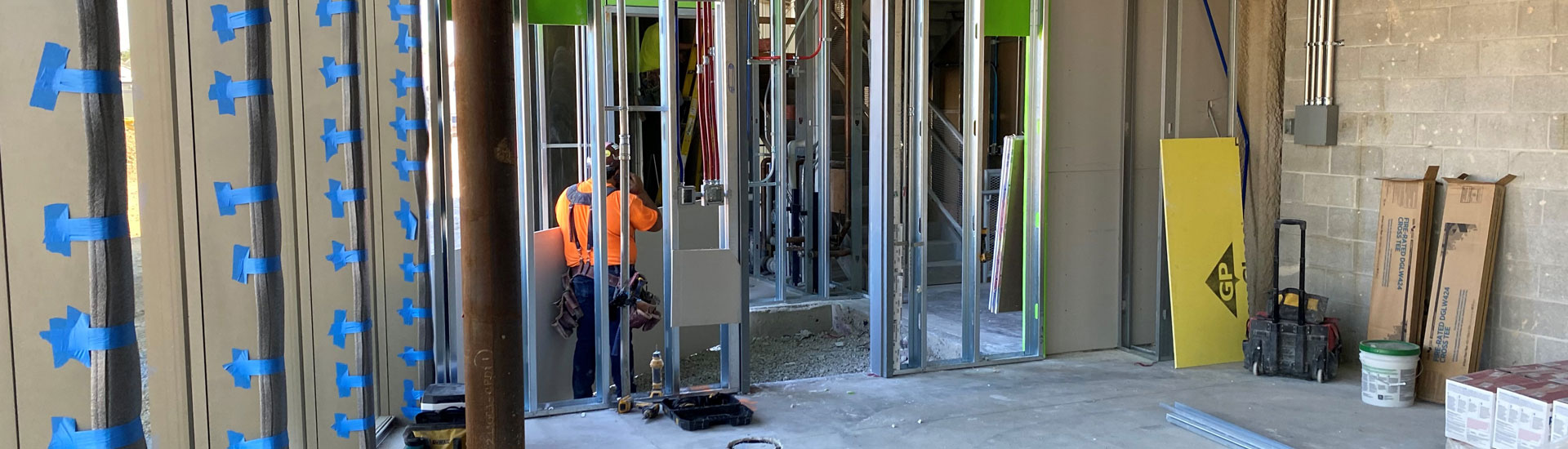 Interior of building under construction with exposed studs